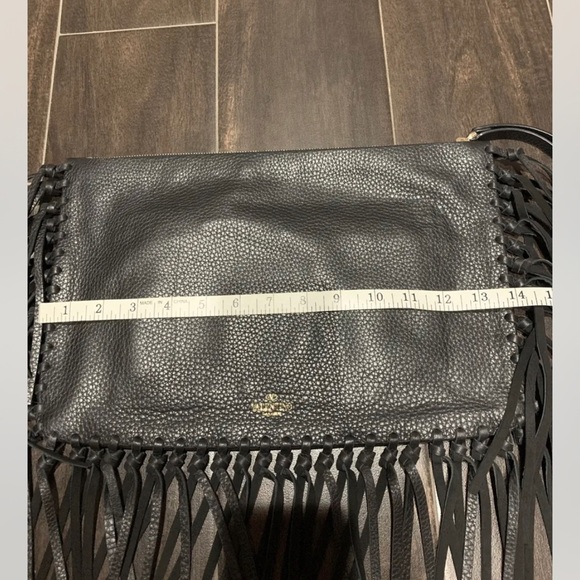 SOLD!!!!


Authentic Valentino Rockee Fringe X-Large Clutch - Picture 5 of 6